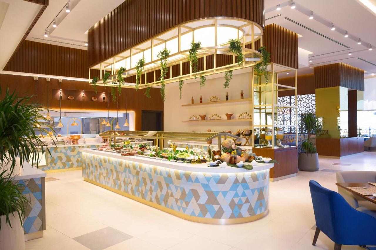 ホテル オクシデンタル アル ジャダフ ドバイ エクステリア 写真 The restaurant